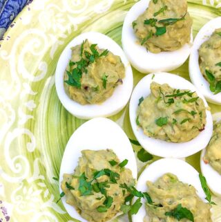 Our easy spicy avocado keto deviled eggs recipe is the best low carb appetizer if you're following the ketogenic diet.