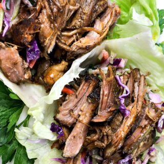 Are you looking for a delicious low carb meal idea to make in your crockpot? This low carb slow cooker pulled pork lettuce wraps recipe is keto diet friendly, delicious and almost effortless for ketogenic dinners!