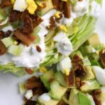 Healthy salads are a staple on the keto diet. This easy wedge salad with the best homemade blue cheese dressing is one of my favorite recipes to serve for a crowd.