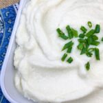 Cauliflower is super popular with people on the keto diet, and for good reason. It's a very versatile vegetable! One of my favorite low carb side dish recipes is this yummy Garlic & Chive Mashed Cauliflower!