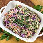 Do you want a quick low carb recipe that won't heat up your house? Our Crunchy Broccoli Slaw is super easy to make in about 5 minutes and is keto diet friendly.