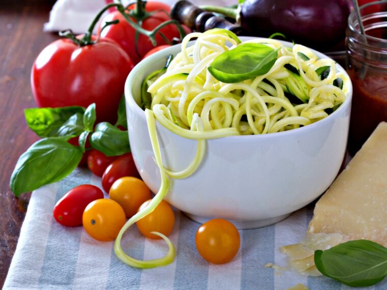 Do you miss pasta on the keto diet? Learn how to swap spiral cut vegetables for pasta. They're so versatile!